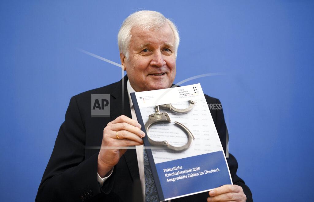 Annegret Hilse German Interior Minister Horst Seehofer presents the crime statistics report for 2020 during a news conference in Berlin, Germany, Thursday, April 15, 2021. (Annegret Hilse/Pool via AP)