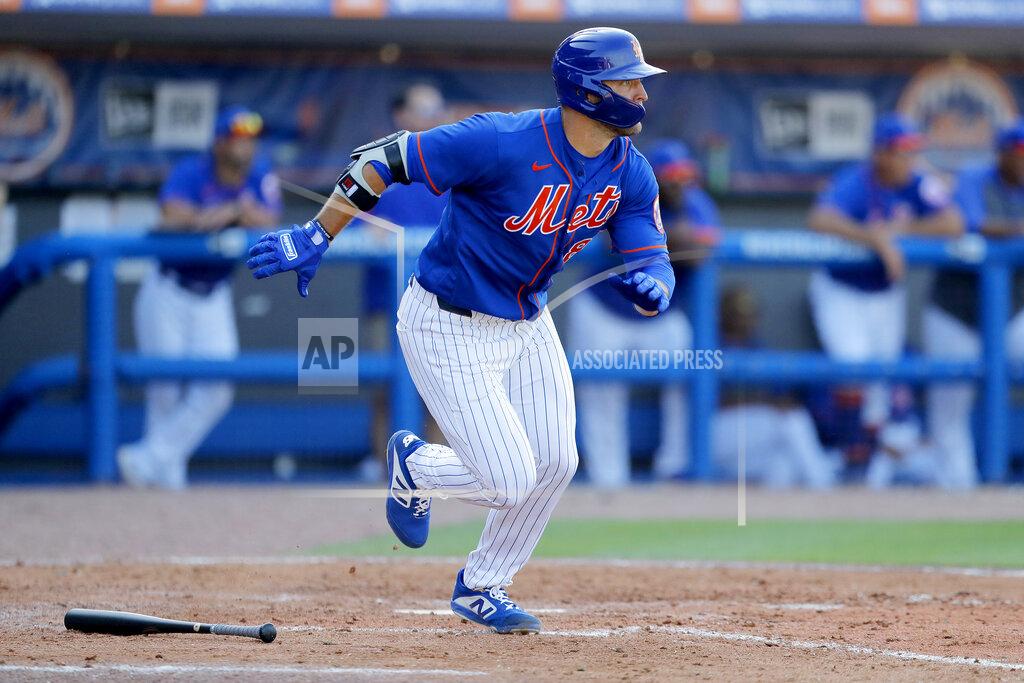 Julio Cortez New York Mets' Tim Tebow runs out a ground out against the St. Louis Cardinals during the eighth inning of a spring training baseball game, Wednesday, March 4, 2020, in Port St. Lucie, Fla. (AP Photo/Julio Cortez)