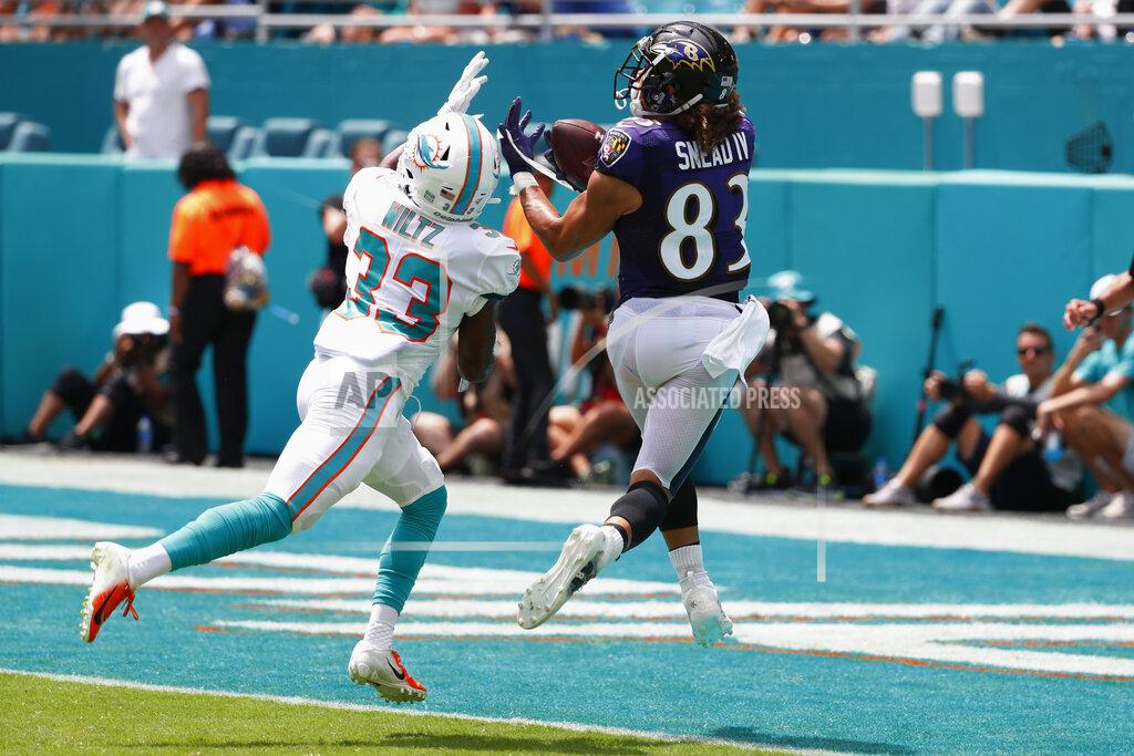 Wilfredo Lee Baltimore Ravens wide receiver Willie Snead (83) catches a pass for a touchdown as Miami Dolphins cornerback Jomal Wiltz (33) attempts to defend, during the first half at an NFL football game, Sunday, Sept. 8, 2019, in Miami Gardens, Fla. (AP Photo/Wilfredo Lee)