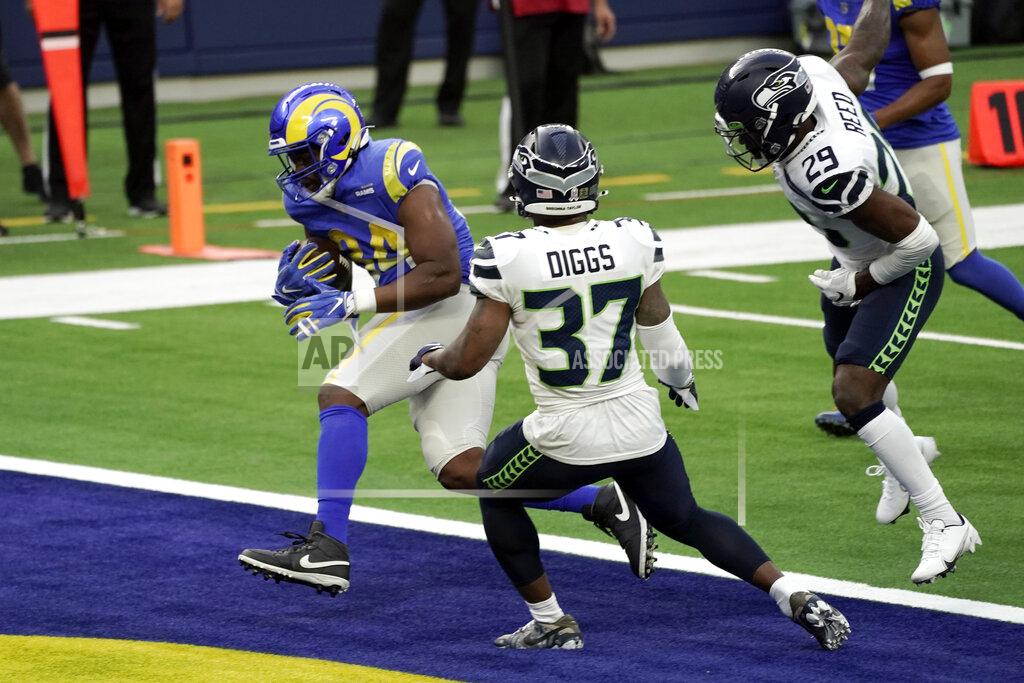 Jae C. Hong Los Angeles Rams running back Malcolm Brown, left, scores against the Seattle Seahawks during the first half of an NFL football game Sunday, Nov. 15, 2020, in Inglewood, Calif. (AP Photo/Jae C. Hong )108