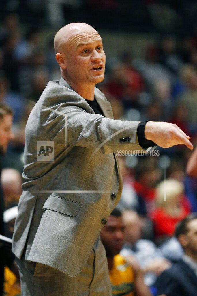 Rogelio V. Solis Southeastern Louisiana head coach David Kiefer signals his team during the first half of an NCAA college basketball game against Mississippi, Saturday, Dec. 21, 2019, in Jackson, Miss. Mississippi won 83-76. (AP Photo/Rogelio V. Solis)