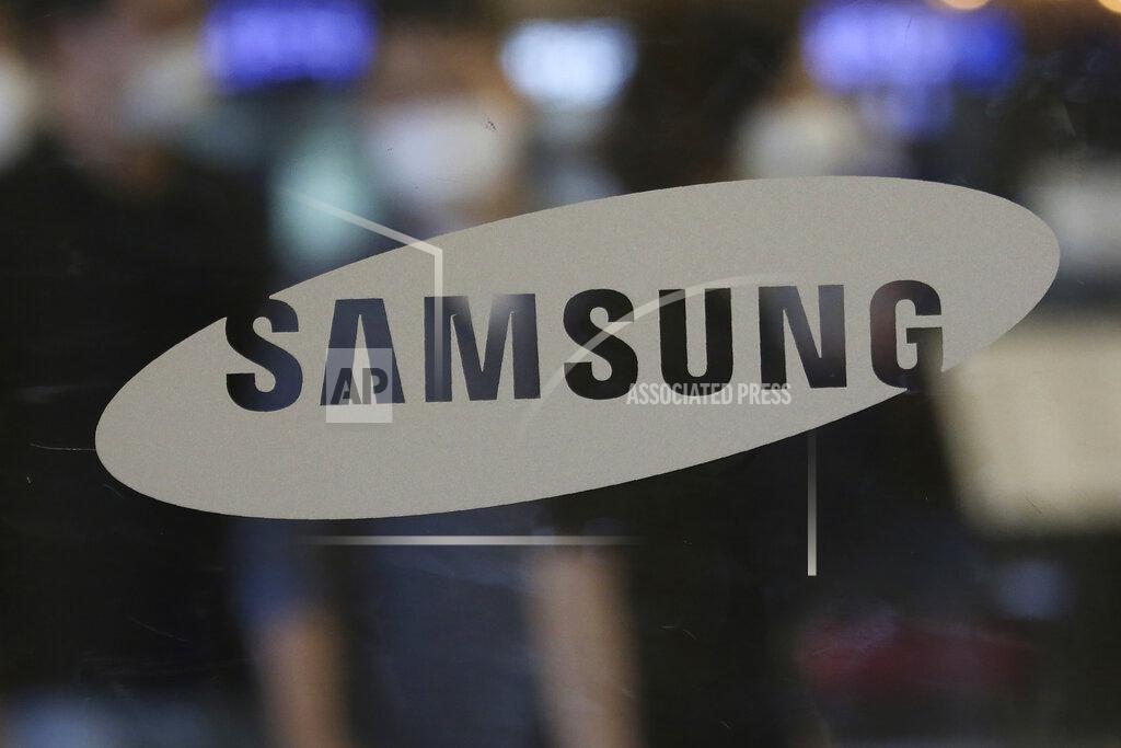Ahn Young-Joon FILE - The logo of the Samsung Electronics Co. is seen at its shop in Seoul, South Korea, Tuesday, July 7, 2020. Samsung is hoping to lift its sinking smartphone sales with three new models that will test consumers willingness to buy high-priced technology during the worst economic downturn since the Great Depression. The latest Galaxy phones unveiled Wednesday, Aug. 5, during an online showcase will cost $1,000 to $1,300. (AP Photo/Ahn Young-joon, File)
