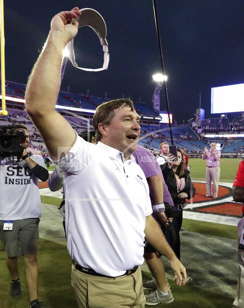 John Raoux Georgia head coach Kirby Smart celebrates in front of fans after defeating Florida in an NCAA college football game Saturday, Oct. 27, 2018, in Jacksonville, Fla. (AP Photo/John Raoux)