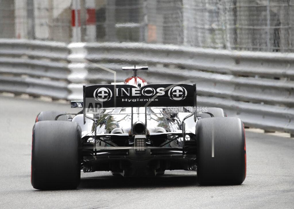 Luca Bruno Mercedes driver Lewis Hamilton of Britain steers his car during the qualifying session at the Monaco racetrack, in Monaco, Saturday, May 22, 2021. The Formula One race will take place on Sunday. (AP Photo/Luca Bruno)