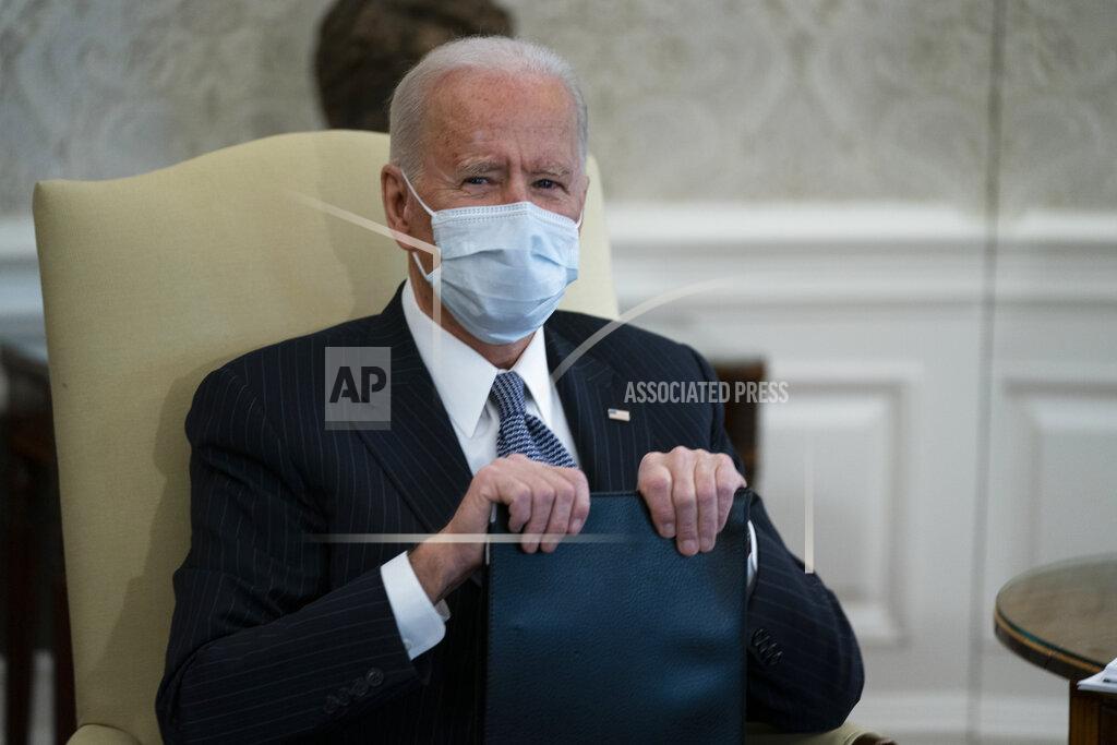 Evan Vucci President Joe Biden meets with Senate Majority Leader Sen. Chuck Schumer of N.Y., and other Democratic lawmakers to discuss a coronavirus relief package, in the Oval Office of the White House, Wednesday, Feb. 3, 2021, in Washington. (AP Photo/Evan Vucci)