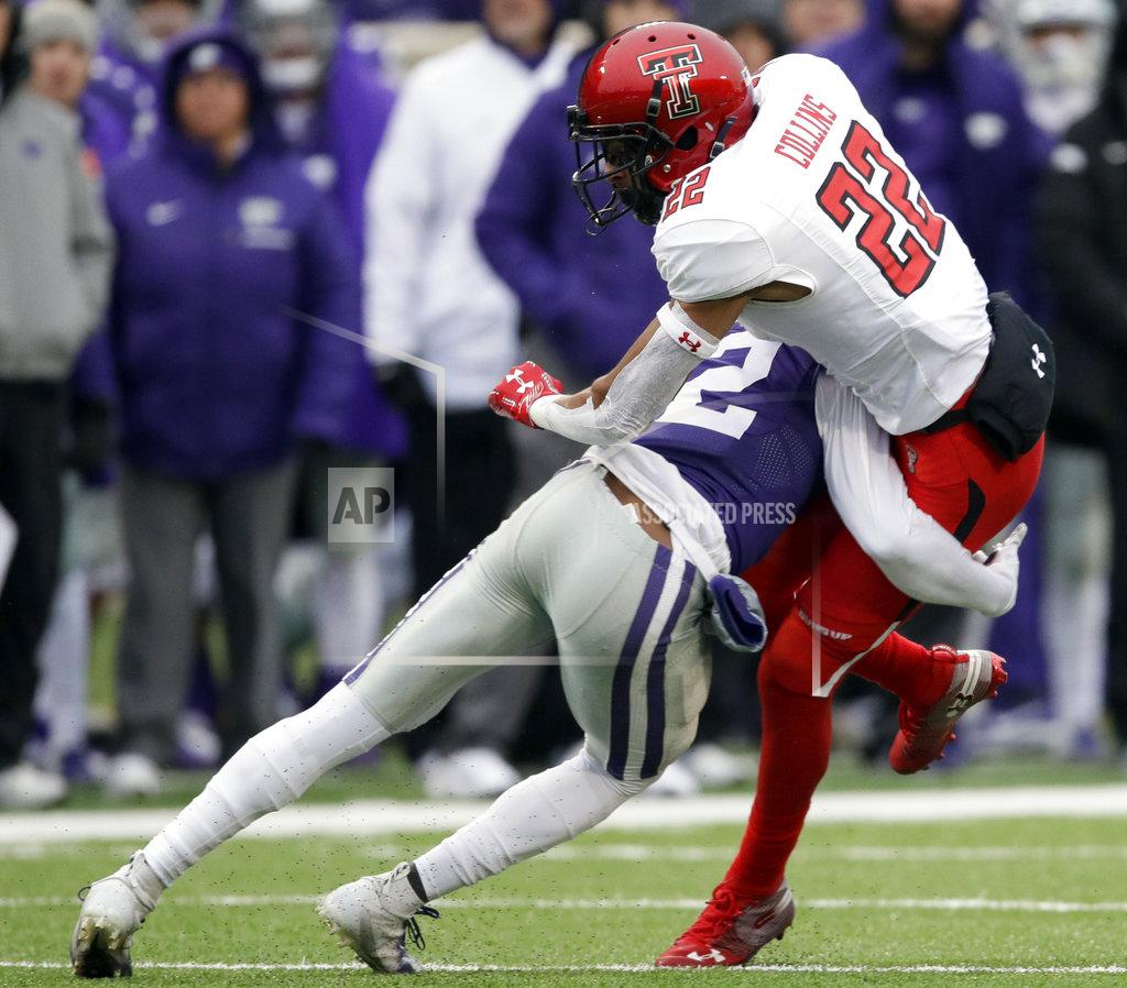 Orlin Wagner Texas Tech wide receiver Seth Collins (22) is tackled by Kansas State defensive back AJ Parker, left, during the first half of an NCAA college football game in Manhattan, Kan., Saturday, Nov. 17, 2018. (AP Photo/Orlin Wagner)