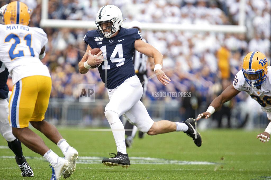 Barry Reeger Penn State quarterback Sean Clifford (14) gains yardage on a run in the second quarter of an NCAA college football game in State College, Pa., on Saturday, Sept. 14, 2019. Penn State defeated Pittsburgh 17-10. (AP Photo/Barry Reeger)
