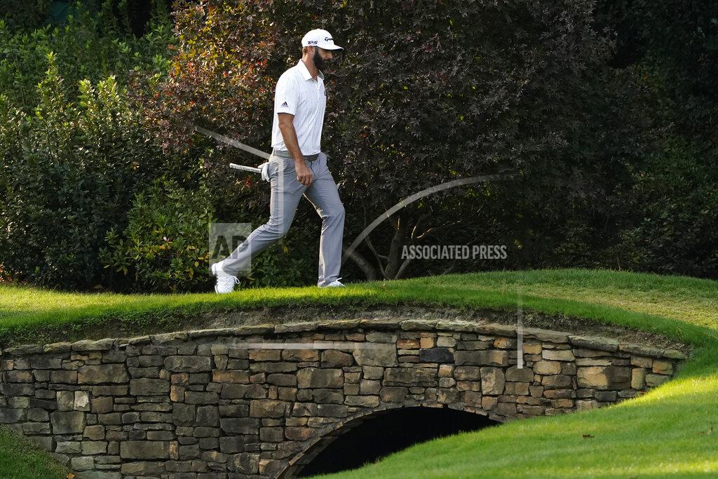 Matt Slocum Dustin Johnson walks to the 14th green during the third round of the Masters golf tournament Saturday, Nov. 14, 2020, in Augusta, Ga. (AP Photo/Matt Slocum)