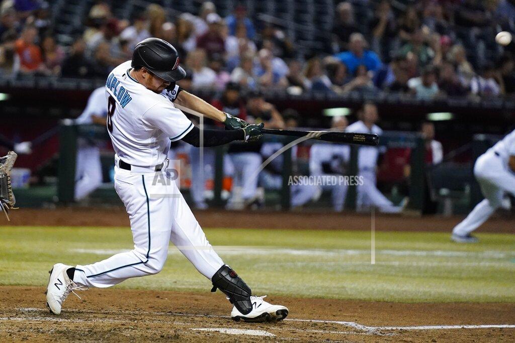 Ross D. Franklin Arizona Diamondbacks' Jordan Luplow hits a three-run home run against the Kansas City Royals during the sixth inning of a baseball game Tuesday, May 24, 2022, in Phoenix. (AP Photo/Ross D. Franklin)