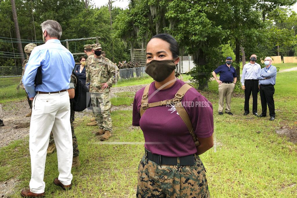 Lolita Baldor Staff Sgt. Katheryn Hunter, a Marine drill instructor at Parris Island Recruit Depot in South Carolina, poses for a photo on May 27, 2020. In ways big and small, the virus is impacting training at the Marine Corps' Parris Island Recruit Depot and across the military. Hunter, a drill instructor for three years at Parris Island, said the main difference she sees due to the virus is that the number of female recruits she has in 4th Battalion, Oscar Company, has dropped to 70.(AP Photo/Lolita Baldor)