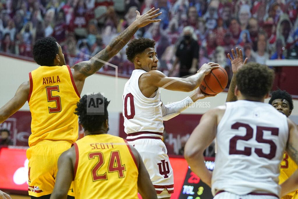 Darron Cummings Indiana guard Rob Phinisee (10) makes a pass against Maryland guard Eric Ayala (5) during the second half of an NCAA college basketball game, Monday, Jan. 4, 2021, in Bloomington, Ind. (AP Photo/Darron Cummings)