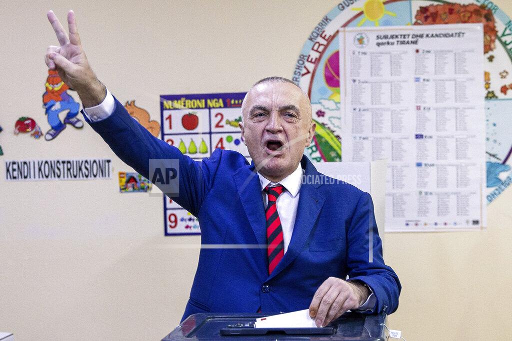 Visar Kryeziu Albanian president Ilir Meta flashes victory sign as he casts his vote during parliamentary elections in capital Tirana, Albania on Sunday, April 25, 2021. Albanian voters have started casting ballots in parliamentary elections on Sunday amid the virus pandemic and a bitter political rivalry between the country's two largest political parties. (AP Photo/Visar Kryeziu)