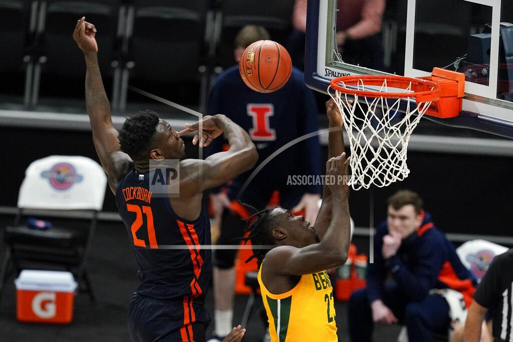 Darron Cummings Baylor's Jonathan Tchamwa Tchatchoua (23) has his shot blocked by Illinois' Kofi Cockburn (21) during the first half of an NCAA college basketball game, Wednesday, Dec. 2, 2020, in Indianapolis. (AP Photo/Darron Cummings)