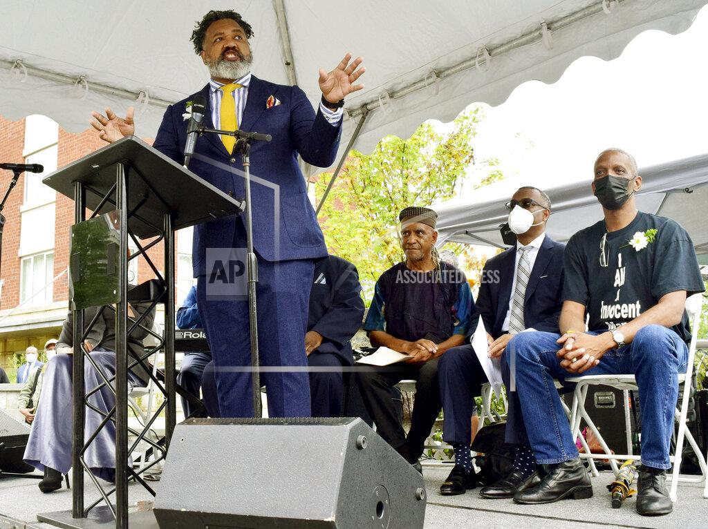 Robin Rudd Committee chairman Donivan Brown opens the events during the dedication ceremony of the Ed Johnson Memorial at the south side of the Walnut Street Bridge in Chattanooga, Tenn., on Sunday, Sept. 19, 2021. On March 19, 1906, Johnson was mob-lynched from the second span of the Walnut Street Bridge. (Robin Rudd/Chattanooga Times Free Press via AP)