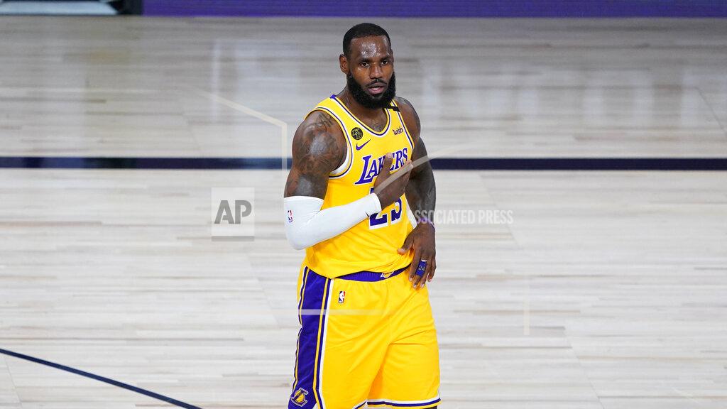 Ashley Landis Los Angeles Lakers' LeBron James (23) reacts after a basket during the first half of an NBA basketball game against the Denver Nuggets, Monday, Aug. 10, 2020, in Lake Buena Vista, Fla. (AP Photo/Ashley Landis, Pool)