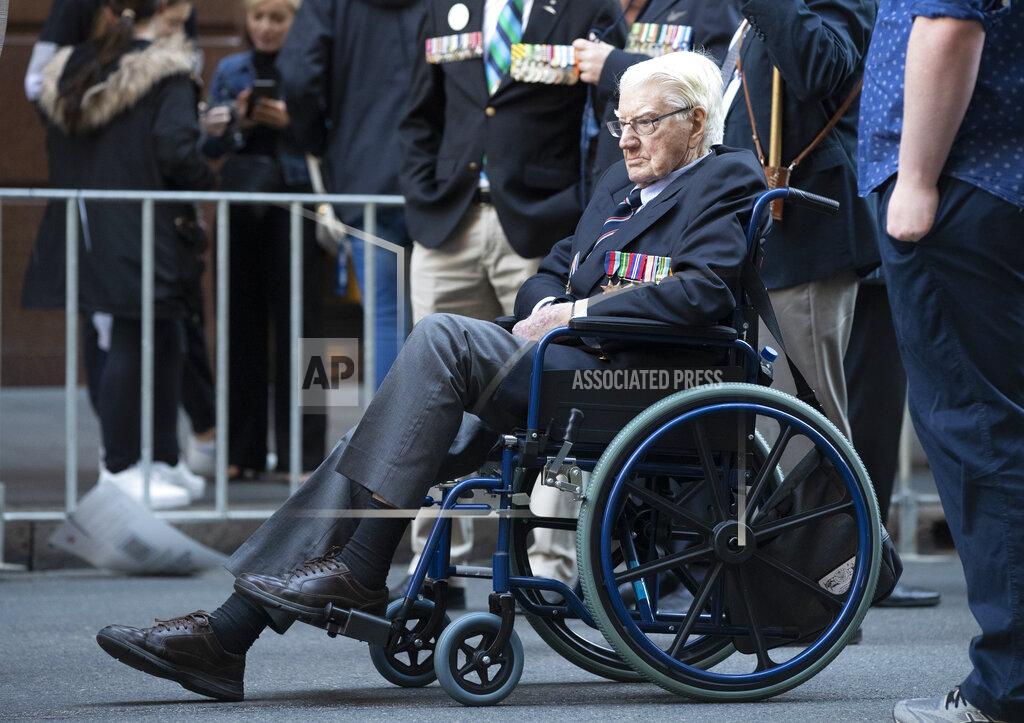 Mark Baker A veteran prepares to join the Anzac Day parade in Sydney, Australia, Sunday, April 25, 2021. Australians and New Zealanders paid tribute to their war dead Sunday as both nations prepared to withdraw from their longest war in Afghanistan. (AP Photo/Mark Baker)