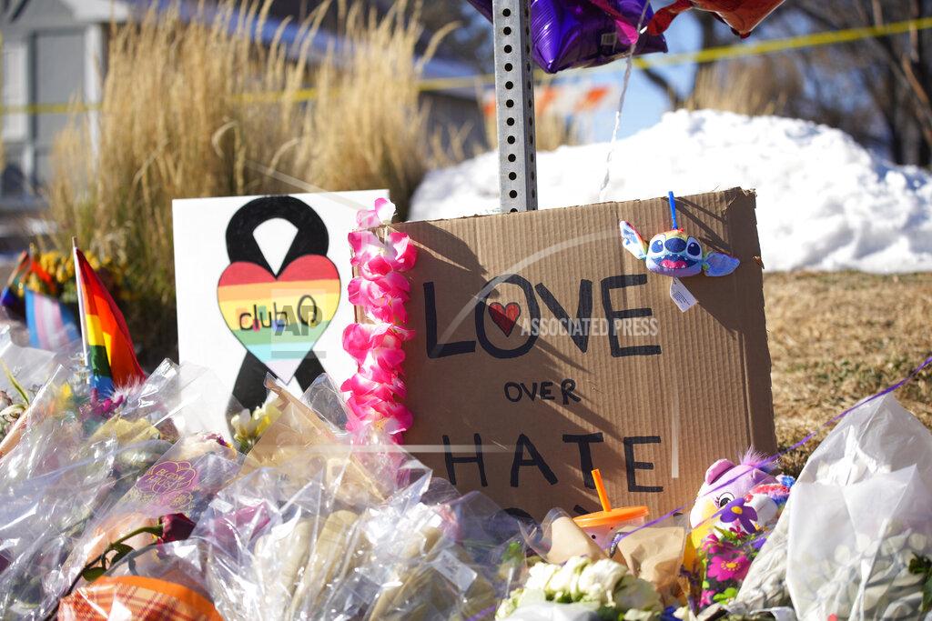 David Zalubowski Bouquets of flowers sit on a corner near the site of a mass shooting at a gay bar Monday, Nov. 21, 2022, in Colorado Springs, Colo. Club Q on its Facebook page thanked the "quick reactions of heroic customers that subdued the gunman and ended this hate attack.” (AP Photo/David Zalubowski)