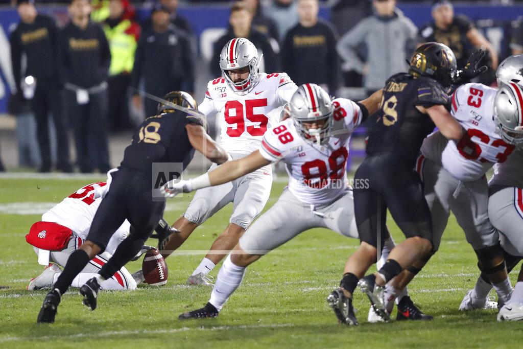 Charles Rex Arbogast Ohio State placekicker Blake Haubeil (95) boots a 55-yard field goal at the end of the first half of an NCAA college football game against Northwestern, Friday, Oct. 18, 2019, in Evanston, Ill. (AP Photo/Charles Rex Arbogast)