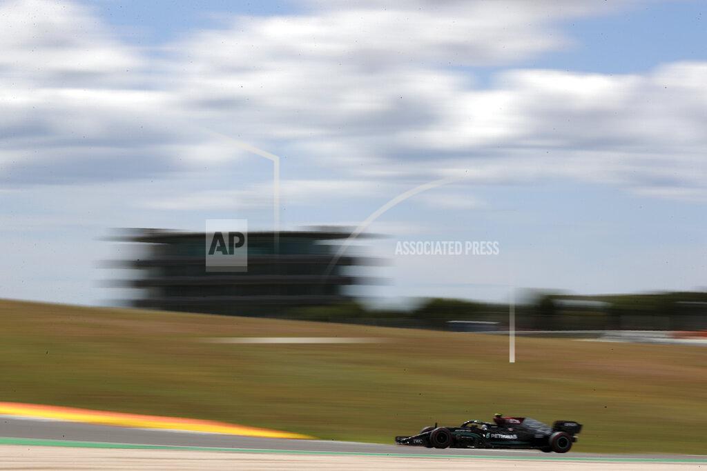 Manu Fernandez Mercedes driver Valtteri Bottas of Finland steers his car during the first free practice session ahead of the Portugal Formula One Grand Prix at the Algarve International Circuit near Portimao, Portugal, Friday, April 30, 2021. The Portugal Grand Prix will be held on Sunday. (AP Photo/Manu Fernandez)