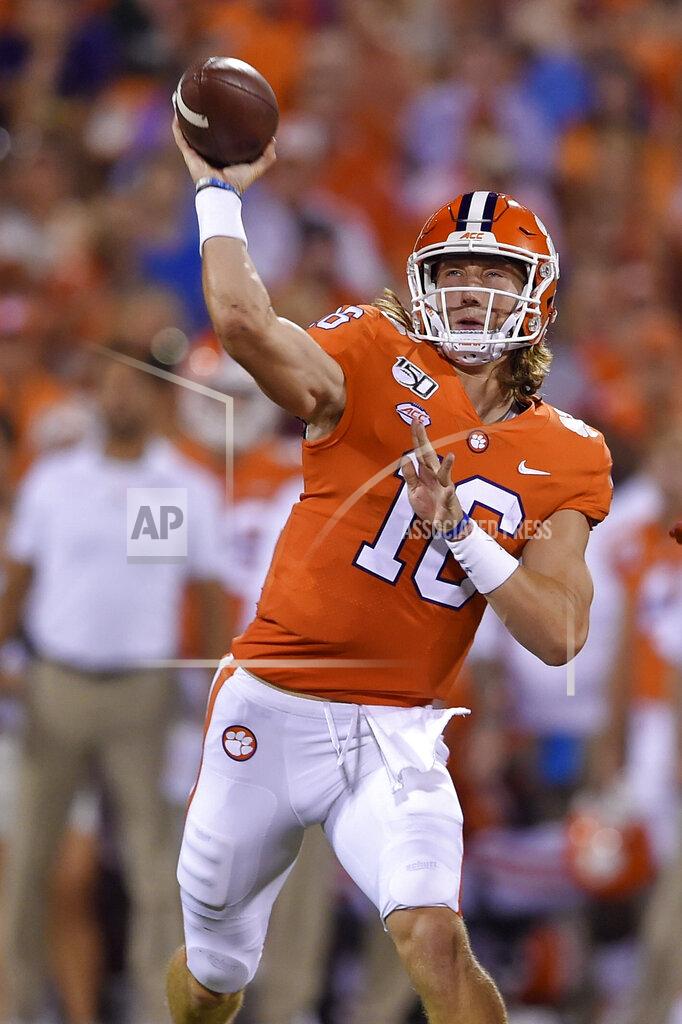 Richard Shiro Clemson quarterback Trevor Lawrence throws a pass during the first half of the team's NCAA college football game against Charlotte on Saturday, Sept. 21, 2019, in Clemson, S.C. (AP Photo/Richard Shiro)