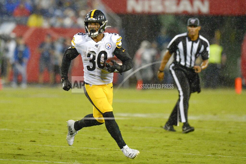 Mark Zaleski Pittsburgh Steelers running back James Conner runs the ball against the Tennessee Titans in the first half of a preseason NFL football game Sunday, Aug. 25, 2019, in Nashville, Tenn. (AP Photo/Mark Zaleski)