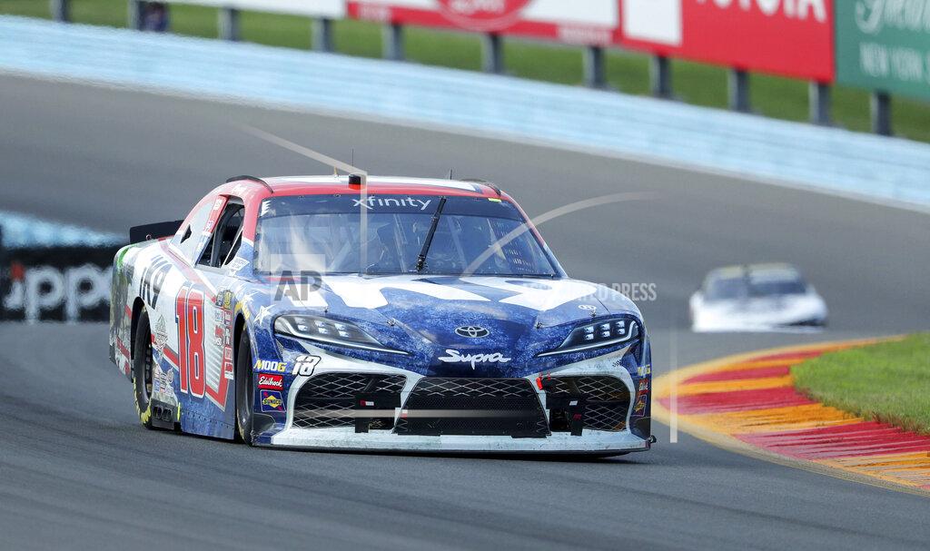 John Munson Kyle Busch (18) drives through the esses during the NASCAR Xfinity Series auto race at Watkins Glen International, Saturday, Aug. 3, 2019, in Watkins Glen, N.Y. (AP Photo/John Munson)