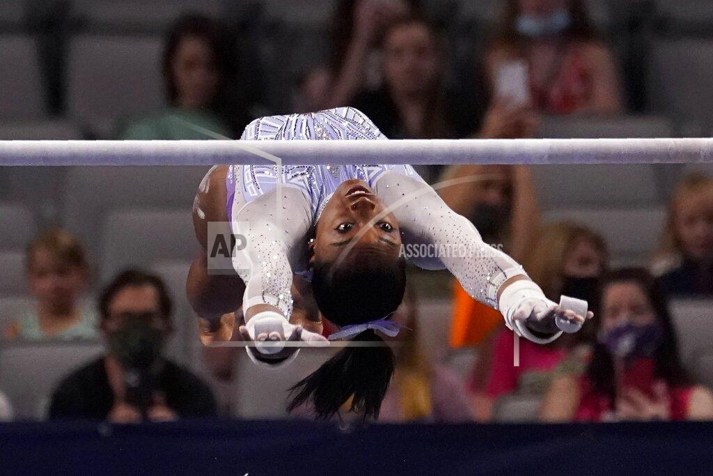Tony Gutierrez Simone Biles competes on the uneven bars during the U.S. Gymnastics Championships, Friday, June 4, 2021, in Fort Worth, Texas. (AP Photo/Tony Gutierrez)