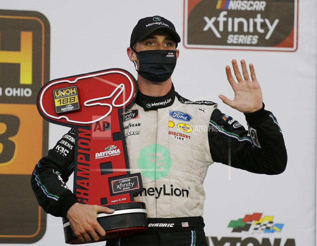 Terry Renna Austin Cindric holds his trophy in Victory Lane after winning the NASCAR Xfinity Series auto race at Daytona International Speedway, Saturday, Aug. 15, 2020, in Daytona Beach, Fla. (AP Photo/Terry Renna)