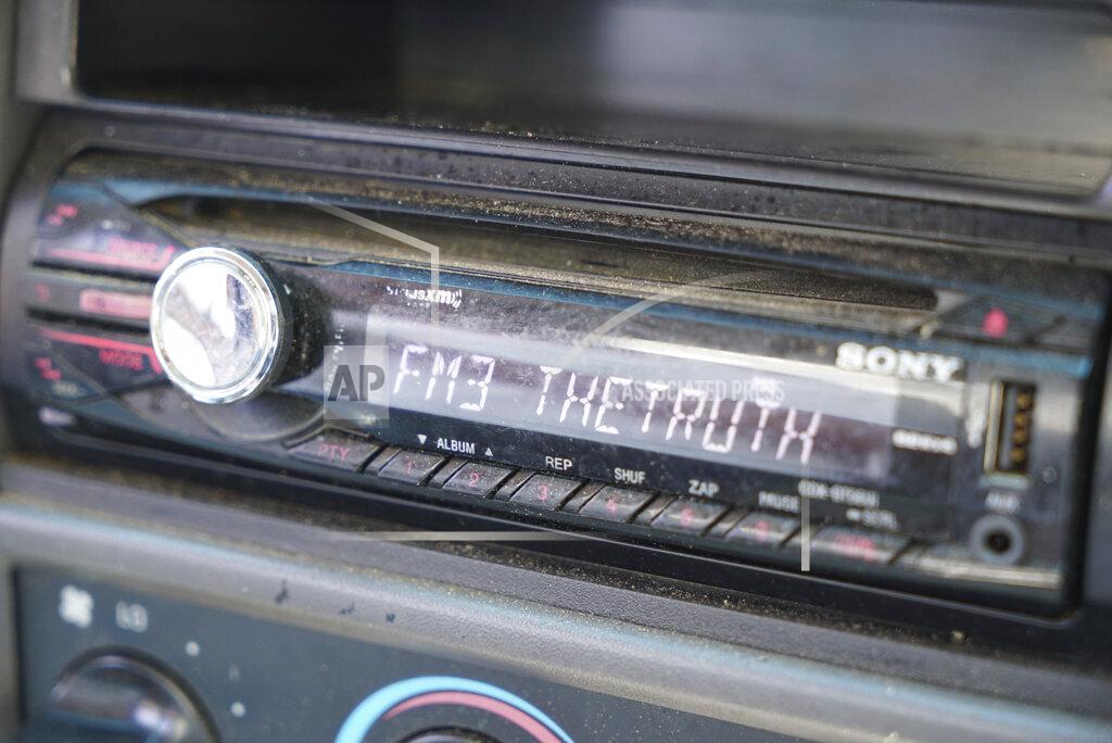 Allen G. Breed The radio in Alton Lucas' pickup is set to his favorite religious station as he does errands around Raleigh, N.C., on Friday, June 18, 2021. Lucas said he still wonders what would happen for him and his family if he no longer carried the weight of a drug-related conviction on his record. “So occasionally, I would go apply for a job just to make them do the background check. I'm making them come back and tell me what they found. And I want to see how they are going to respond to me. ... It’s almost like a life sentence." (AP Photo/Allen G. Breed)