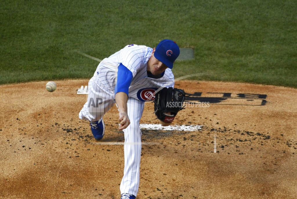 David Banks Chicago Cubs starting pitcher Kyle Hendricks throws the ball during the first inning against the Milwaukee Brewers during an opening day baseball game Friday, July, 24, 2020, in Chicago. (AP Photo/David Banks)