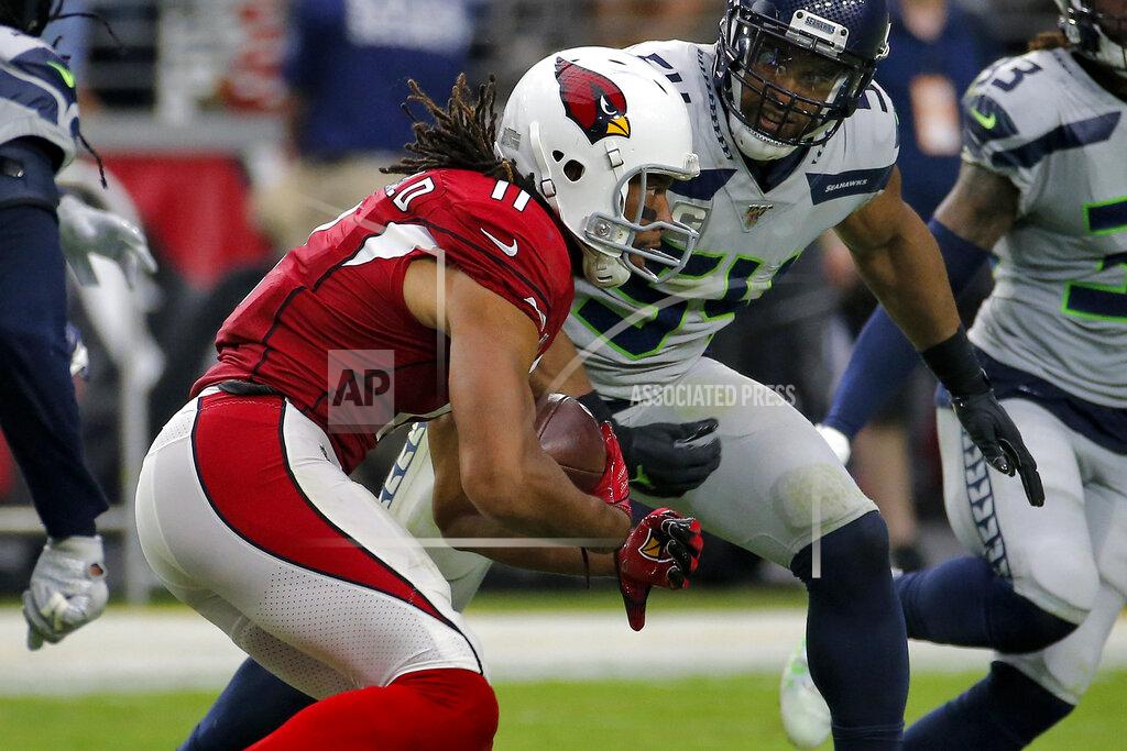Rick Scuteri Arizona Cardinals wide receiver Larry Fitzgerald (11) catches his career 1,325 catch to tie Tony Gonzalez for second place on the all-time receptions list during the second half of an NFL football game against the Seattle Seahawks, Sunday, Sept. 29, 2019, in Glendale, Ariz. (AP Photo/Rick Scuteri)