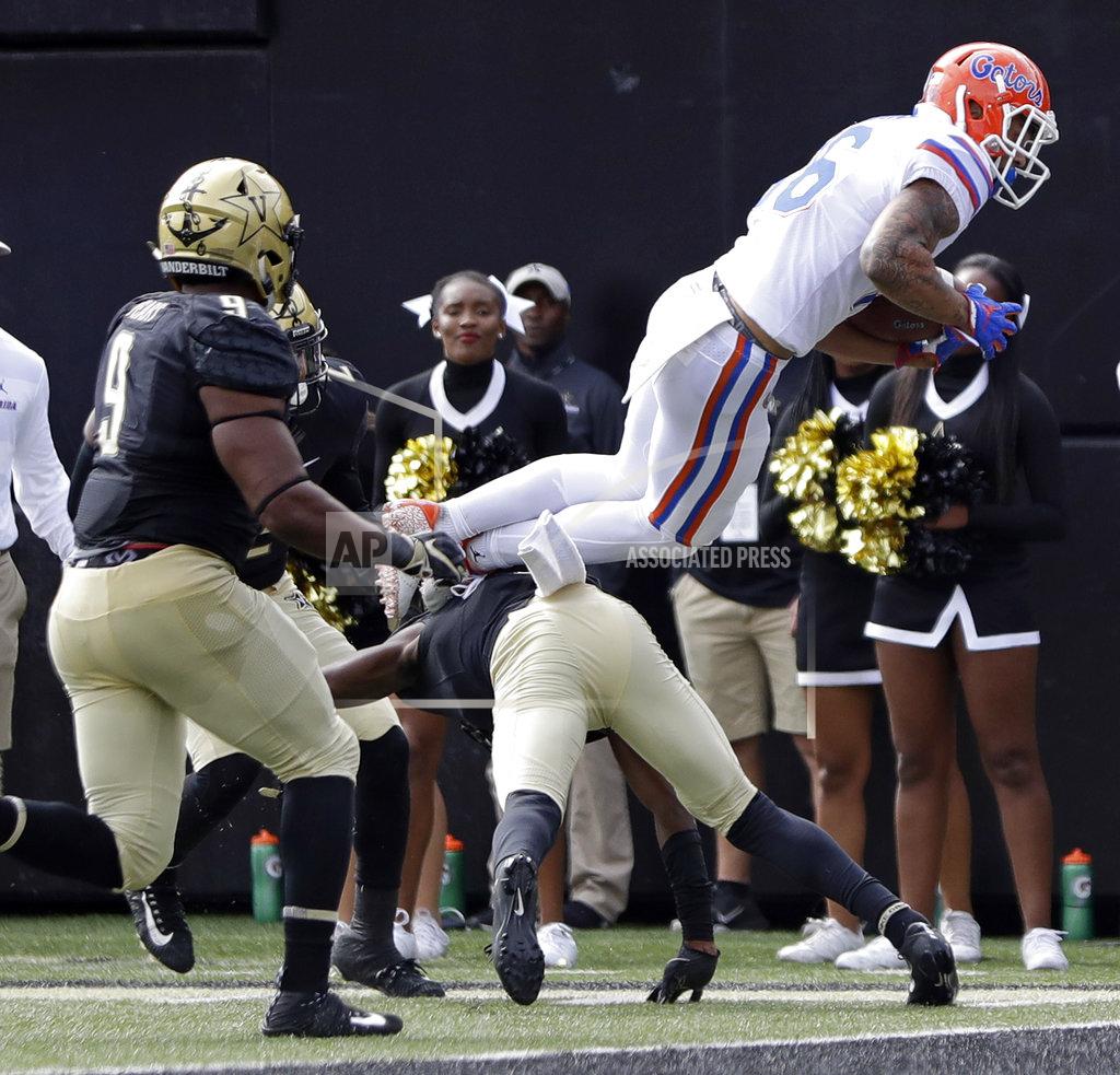 Mark Humphrey Florida wide receiver Freddie Swain (16) dives into the end zone for a touchdown against Vanderbilt in the second half of an NCAA college football game Saturday, Oct. 13, 2018, in Nashville, Tenn. (AP Photo/Mark Humphrey)