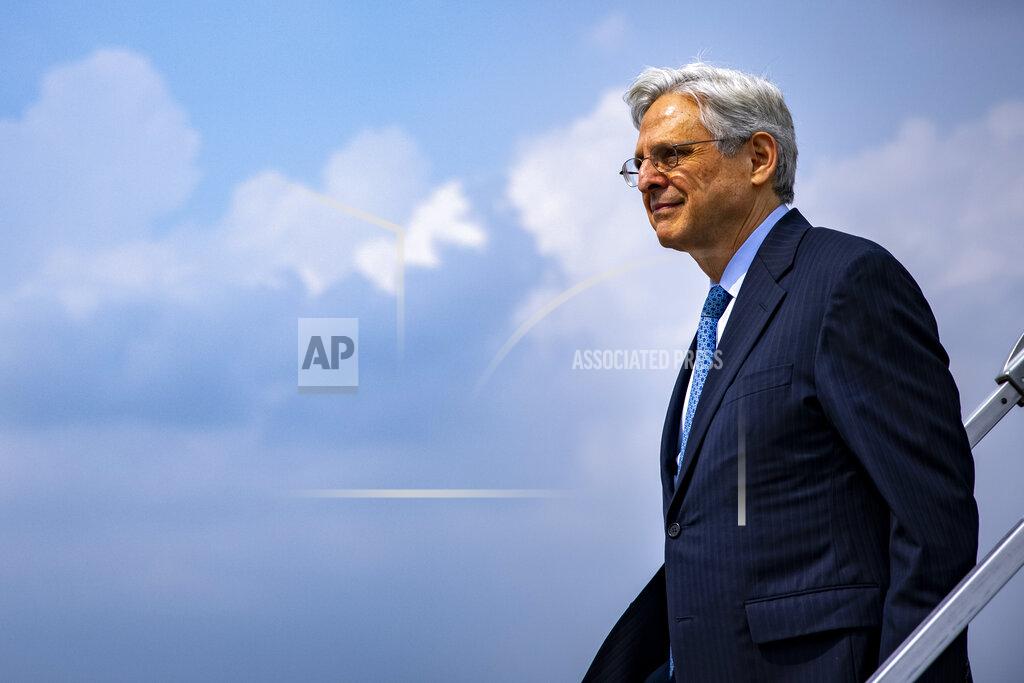 Samuel Corum Attorney General Merrick Garland arrives at Midway International Airport in Chicago, Thursday, July 22, 2021. Garland announced an initiative to reduce gun violence with five cross-jurisdictional strike forces by disrupting illegal firearms trafficking in key regions across the United States. (Samuel Corum/Pool via AP)