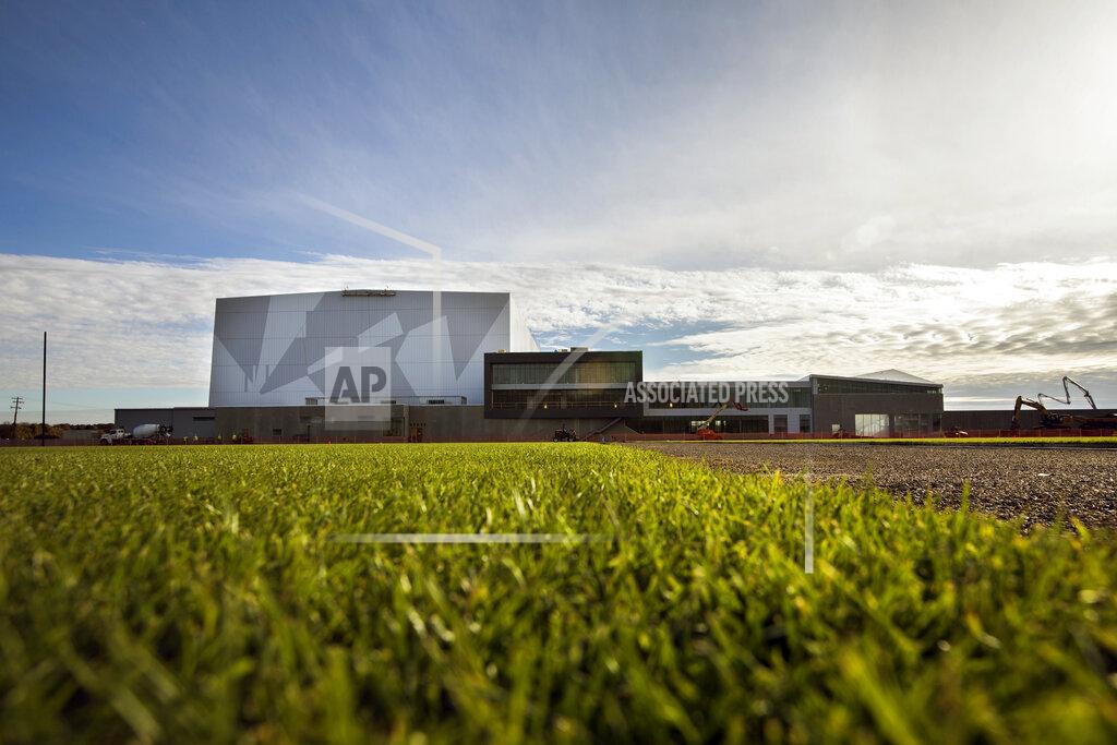 Leila Navidi FILE - This is an Oct. 23, 2017, file photo showing the practice field with the Minnesota Vikings office building and indoor practice arena under construction in the background in Eagan, Minn. General managers around the league ran their drafts virtually without a hitch last month, thanks largely to the work and ingenuity of their information technology staffs. Tech support remains a vital role in the NFL offseason as long as team facilities are closed, with coaches and officials needing to connect with players scattered about the country.(Leila Navidi/Star Tribune via AP, FIle)