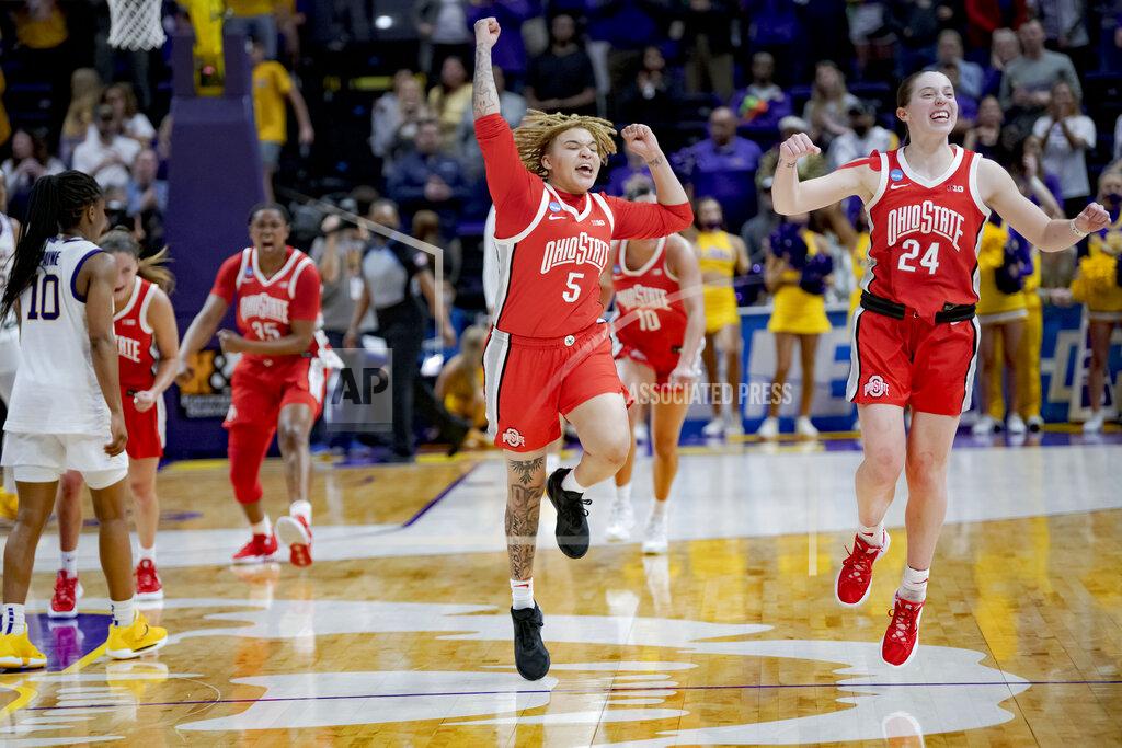 Matthew Hinton Ohio State guard Kateri Poole (5), center, and guard Taylor Mikesell (24) celebrate their victory over LSU in a women's college basketball game in the second round of the NCAA tournament, Monday, March 21, 2022, in Baton Rouge, La. (AP Photo/Matthew Hinton)
