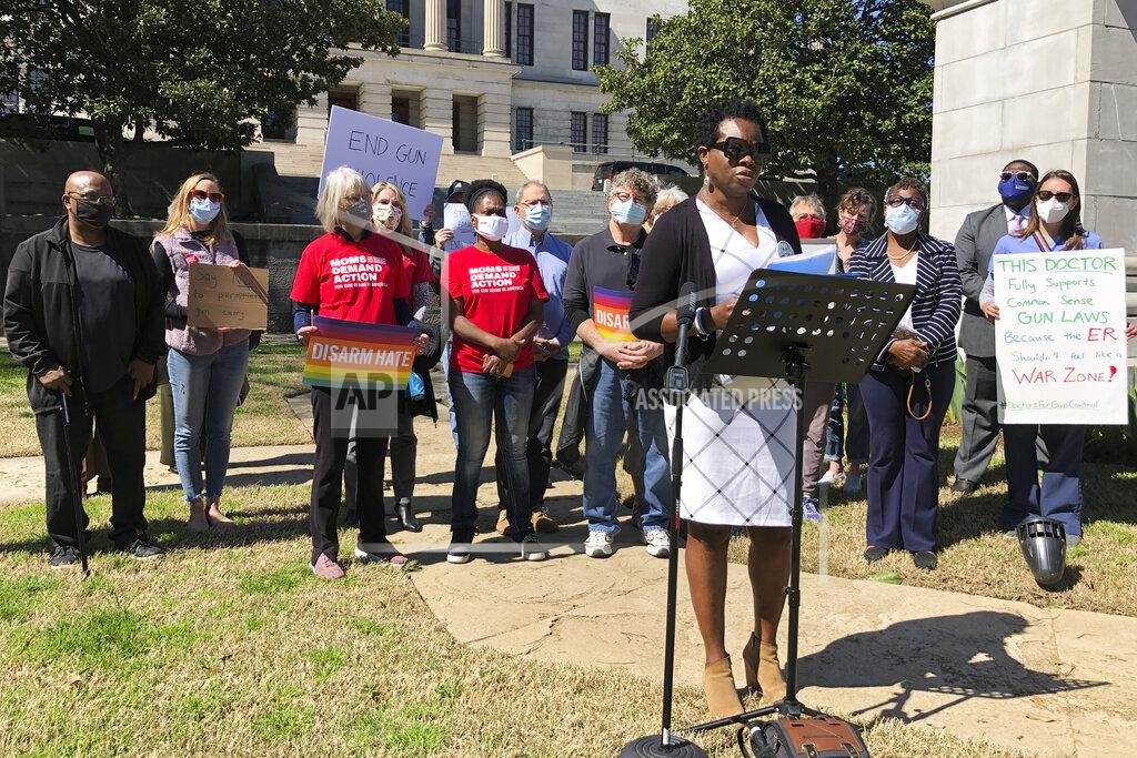 Shaundelle Brooks, appearing with a group of faith leaders, speaks near the Tennessee Capitol Monday, March 29, 2021, in Nashville, Tenn. Brooks spoke against a bill that would lift permitting requirements to carry a handgun. Brooks' son, Akilah DaSilva, was one of four people killed in a shooting at a Nashville Waffle House in 2018. (AP Photo/Jonathan Mattise)