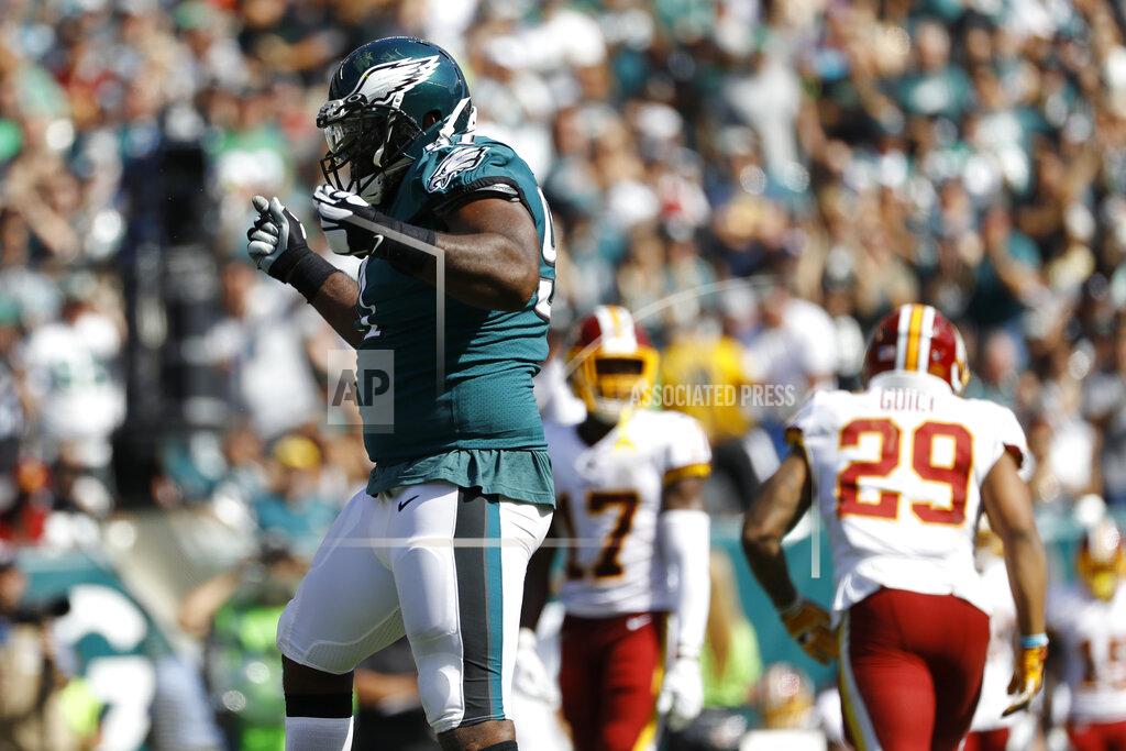 Michael Perez Philadelphia Eagles' Fletcher Cox, left, celebrates after tackling Washington Redskins' Derrius Guice during the second half of an NFL football game Sunday, Sept. 8, 2019, in Philadelphia. (AP Photo/Michael Perez)