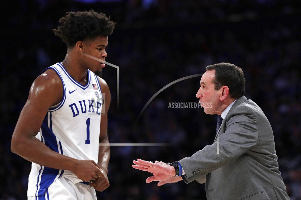 Adam Hunger Duke coach Mike Krzyzewski talks with center Vernon Carey Jr. during the second half of the team's NCAA college basketball game against Kansas on Tuesday, Nov. 5, 2019, in New York. (AP Photo/Adam Hunger)