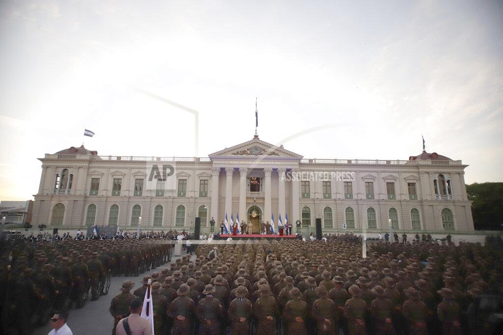 FILE - In this Feb. 18, 2020 file photo, El Salvador's President Nayib Bukele delivers his speech to the newly inducted members of the armed forces at Gerardo Barrios square in front of the National Palace in San Salvador, El Salvador. A senior U.S. official quietly told El Salvador's government in a letter that anti-poverty assistance from Washington is at risk over Bukele's defiance of his country's supreme court and congress. With Congress considering whether to extend a Sept. 9 deadline for spending the U.S. aid, the criticism reflects growing concerns among mainly Democratic lawmakers that Bukele is taking his country down an authoritarian path, such as his use of troops to intimidate legislators and his rejection of high court ruling against tough pandemic restrictions. (AP Photo/Salvador Melendez, File)