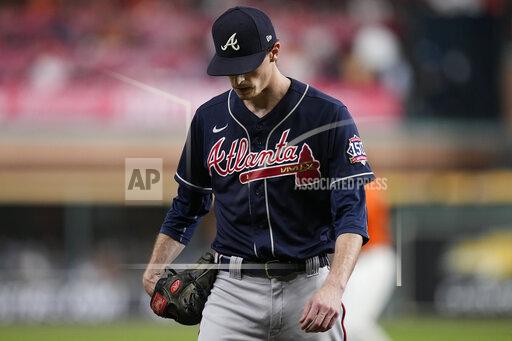 Atlanta Braves starting pitcher Max Fried leaves the game during the sixth inning in Game 2 of baseball's World Series between the Houston Astros and the Atlanta Braves Wednesday, Oct. 27, 2021, in Houston. (AP Photo/Eric Gay)