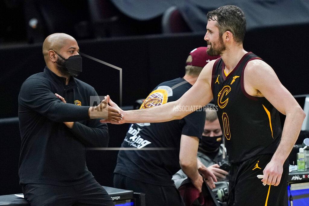 Tony Dejak Cleveland Cavaliers' Kevin Love, right, is congratulated by coach J.B. Bickerstaff during the second half of the team's NBA basketball game against the Boston Celtics, Wednesday, May 12, 2021, in Cleveland. The Cavaliers won 102-94. (AP Photo/Tony Dejak)