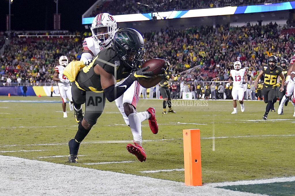 Tony Avelar Oregon wide receiver Jaylon Redd (30) is pushed out of bounds by Utah defensive back Josh Nurse (14) short of the goal line during the first half of the Pac-12 Conference championship NCAA college football game in Santa Clara, Calif., Friday, Dec. 6, 2018. (AP Photo/Tony Avelar)