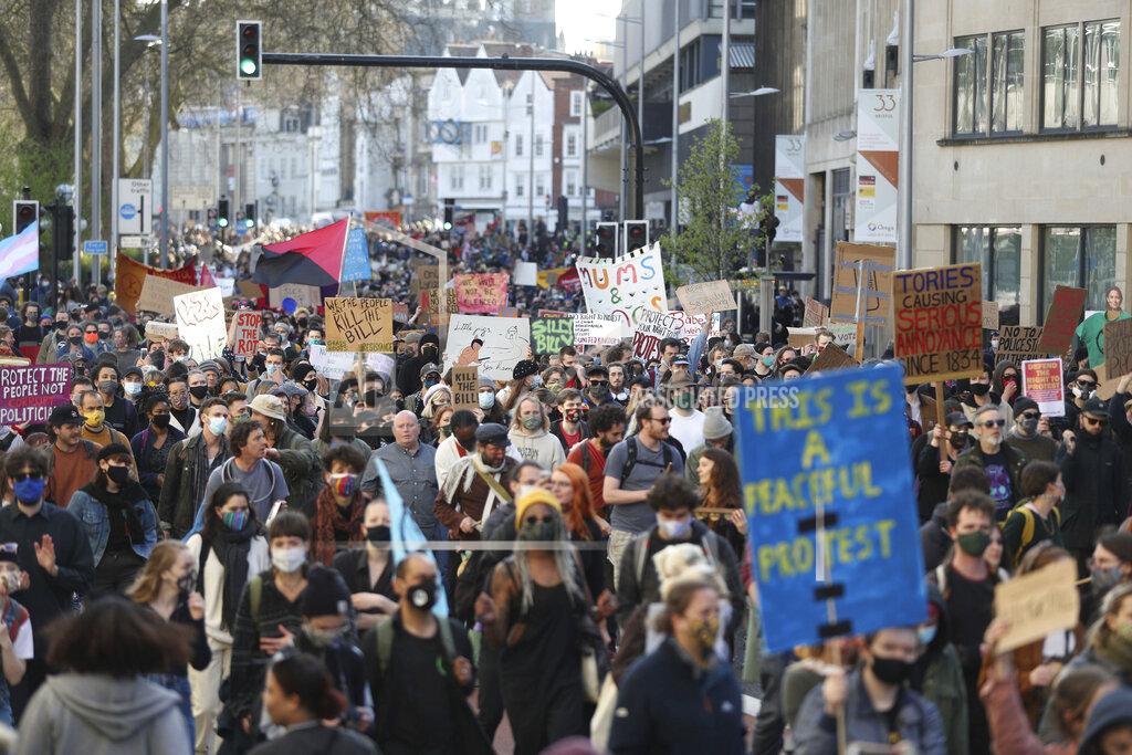 Andrew Matthews Demonstrators march during a 'Kill the Bill' protest in Bristol, England, Saturday, April 3, 2021. The demonstration is against the contentious Police, Crime, Sentencing and Courts Bill, which is currently going through Parliament and would give police stronger powers to restrict protests. (Andrew Matthews/PA via AP)