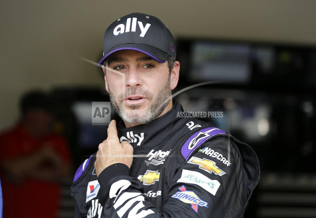Terry Renna Jimmie Johnson leaves his garage after NASCAR auto racing practice at Daytona International Speedway, Saturday, Feb. 16, 2019, in Daytona Beach, Fla. (AP Photo/Terry Renna)