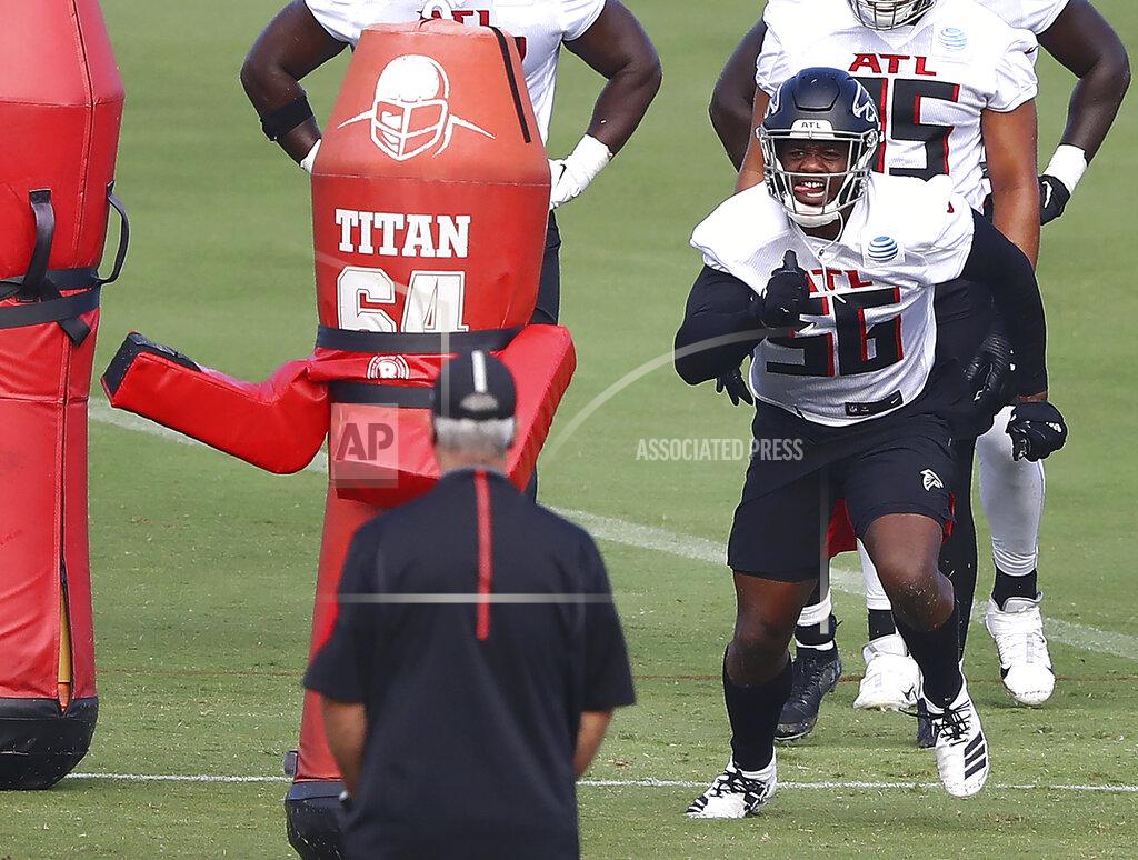 Atlanta Falcons defensive end Dante Fowler (56) runs a drill during NFL football training camp on Wednesday, Aug. 19, 2020, in Flowery Branch, Ga. (Curtis Compton/Atlanta Journal-Constitution via AP, Pool)