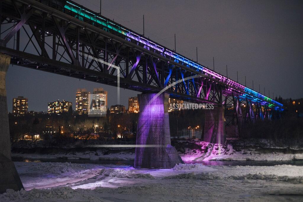 Amber Bracken Edmonton's High-level Bridge is lit up for New Year's Eve in Edmonton, Alberta, Thursday, Dec. 31, 2020. (Amber Bracken/The Canadian Press via AP)