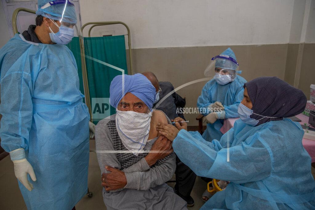 Dar Yasin A Kashmiri man receives the COVISHIELD vaccine for COVID-19 at a primary health center in Srinagar, Indian controlled Kashmir, Wednesday, April 28, 2021. India, a country of nearly 1.4 billion people, Wednesday became the fourth nation to cross 200,000 deaths. (AP Photo/ Dar Yasin)