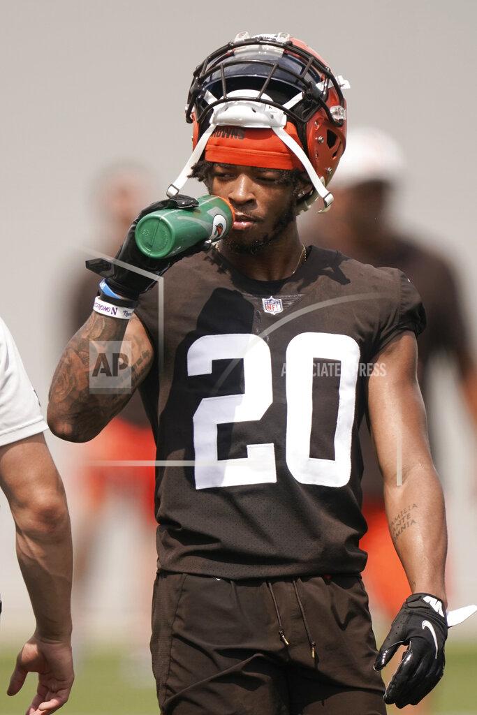 Tony Dejak Cleveland Browns cornerback Greg Newsome II takes a break during an NFL football practice, Saturday, July 31, 2021, in Berea, Ohio. (AP Photo/Tony Dejak)