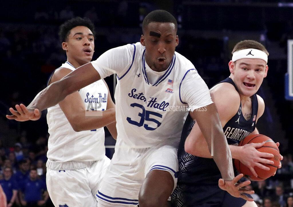 Julio Cortez Georgetown guard Mac McClung, right, drives against Seton Hall center Romaro Gill during the second half of an NCAA college basketball game in the Big East men's tournament, Thursday, March 14, 2019, in New York. Seton Hall won 73-57. (AP Photo/Julio Cortez)