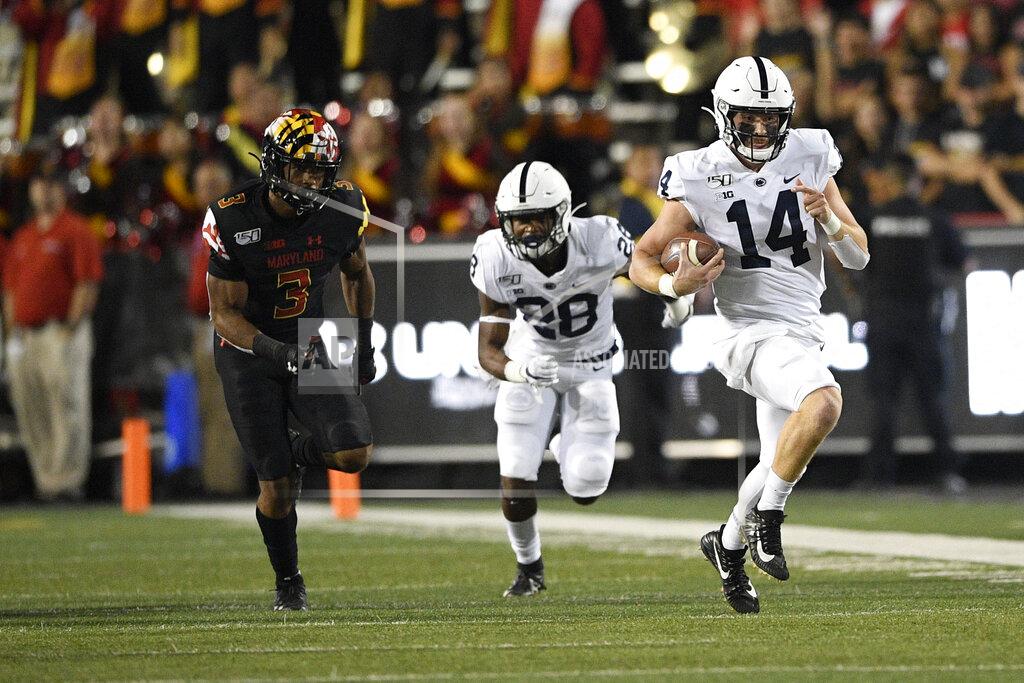 Nick Wass Penn State quarterback Sean Clifford (14) scrambles with the ball against Maryland defensive back Nick Cross (3) during the first half of an NCAA college football game, Friday, Sept. 27, 2019, in College Park, Md. Also seen is Penn State running back Devyn Ford (28). (AP Photo/Nick Wass)